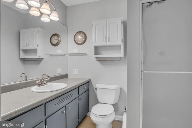 a house with lots of trees in the background