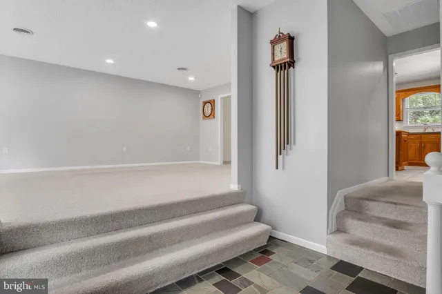 a bathroom with a tub and shower