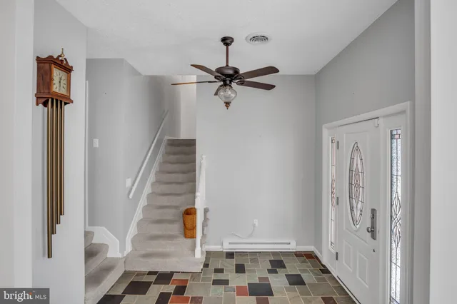 a view of entryway with a front door