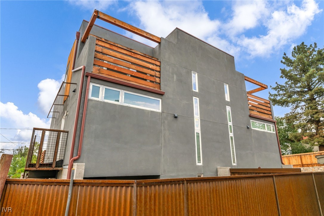 343 Mt Rose Street Reno, NV 89509 - Photo 4 of 46 a front view of a house with a balcony