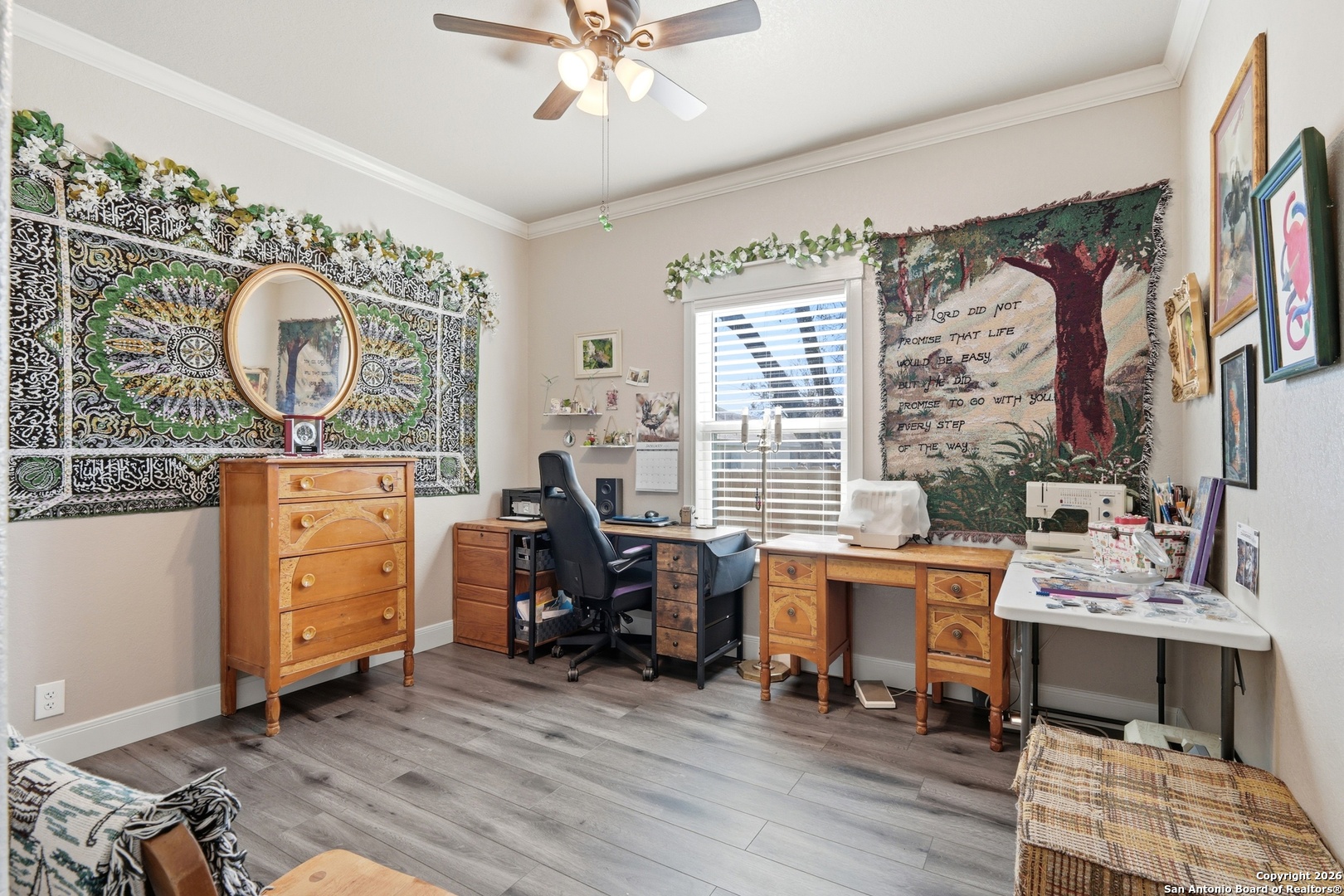 682 Stuart Road Adkins, TX 78101 - Photo 21 of 37 a view of a workspace with furniture and a window