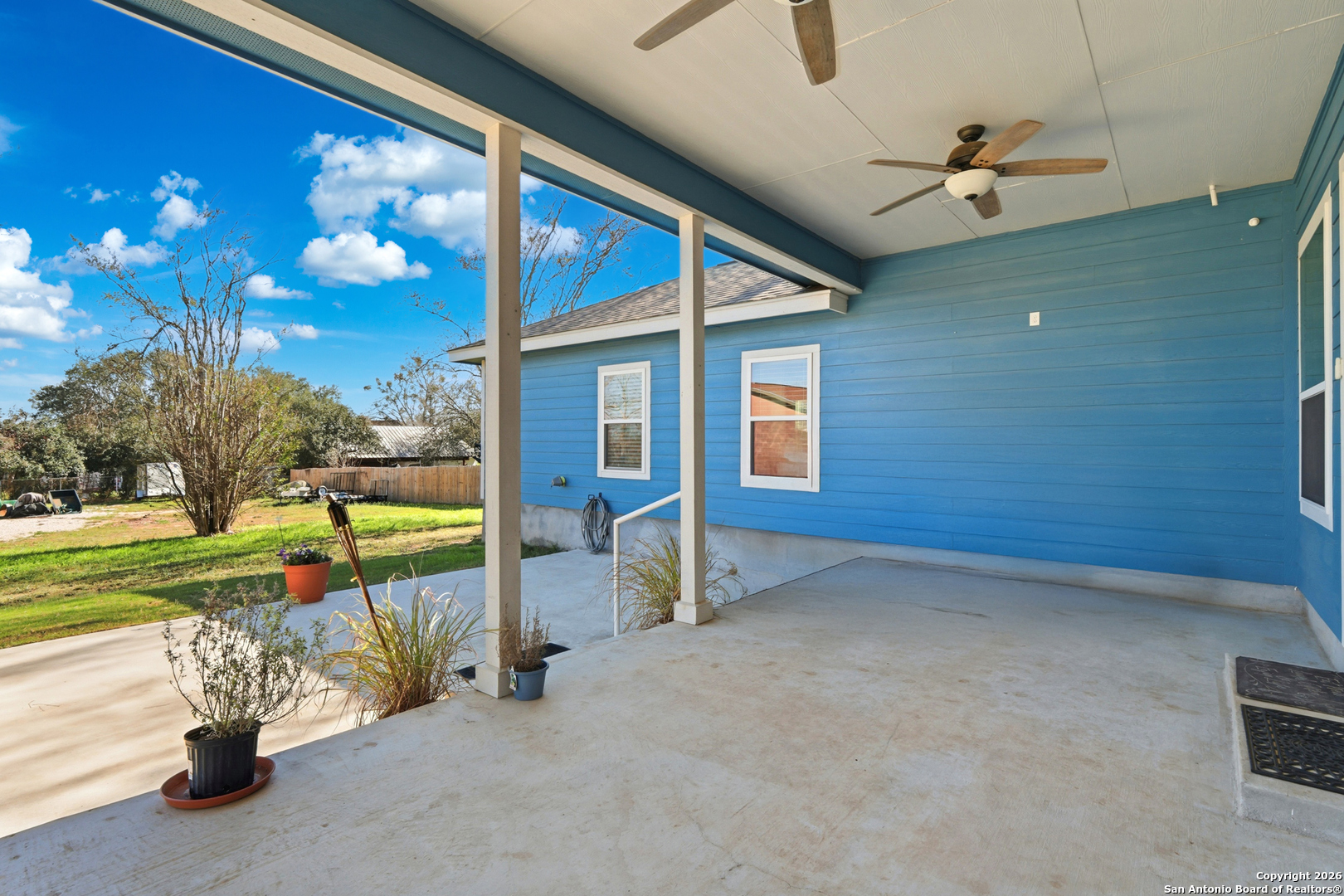 682 Stuart Road Adkins, TX 78101 - Photo 26 of 37 a view of a porch with furniture and garden