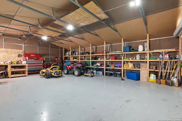 a view of a garage with storage