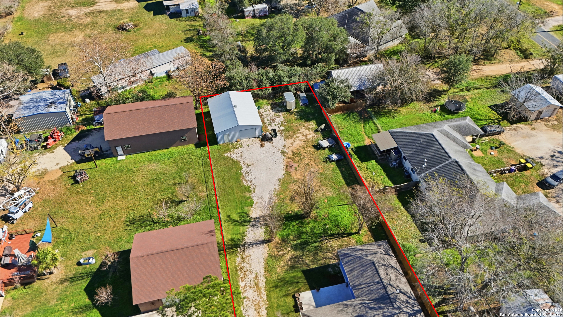 682 Stuart Road Adkins, TX 78101 - Photo 35 of 37 an aerial view of a house with a yard