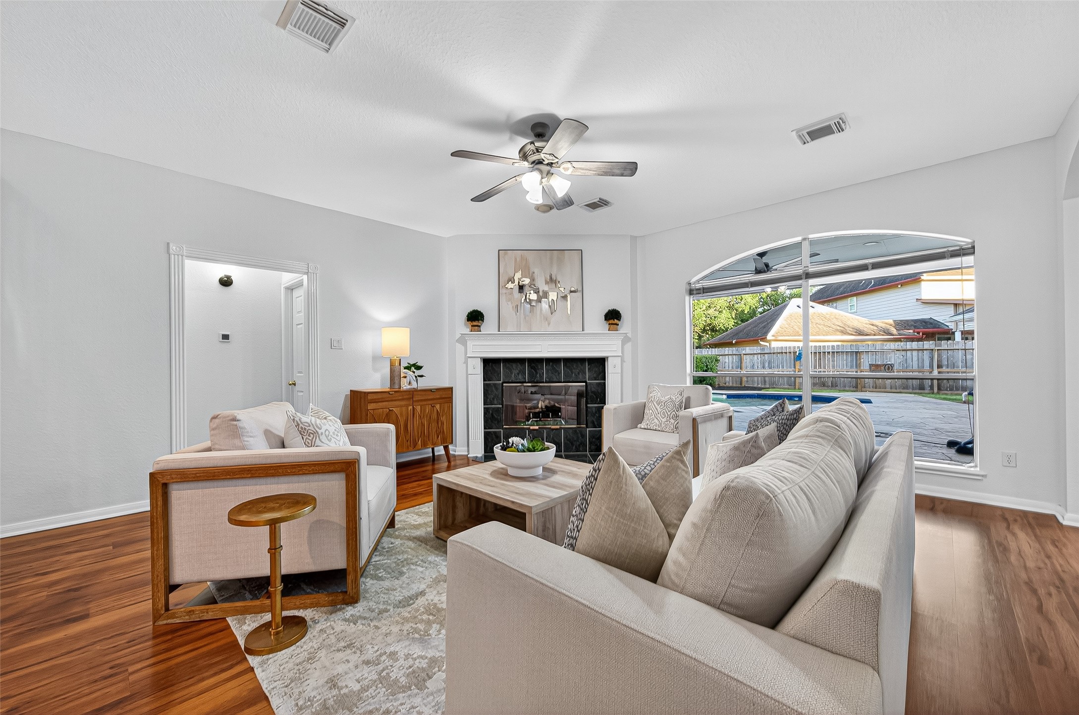 13011 Mossy Ridge Cove Houston, TX 77041 - Photo 13 of 50 a living room with furniture and a fireplace
