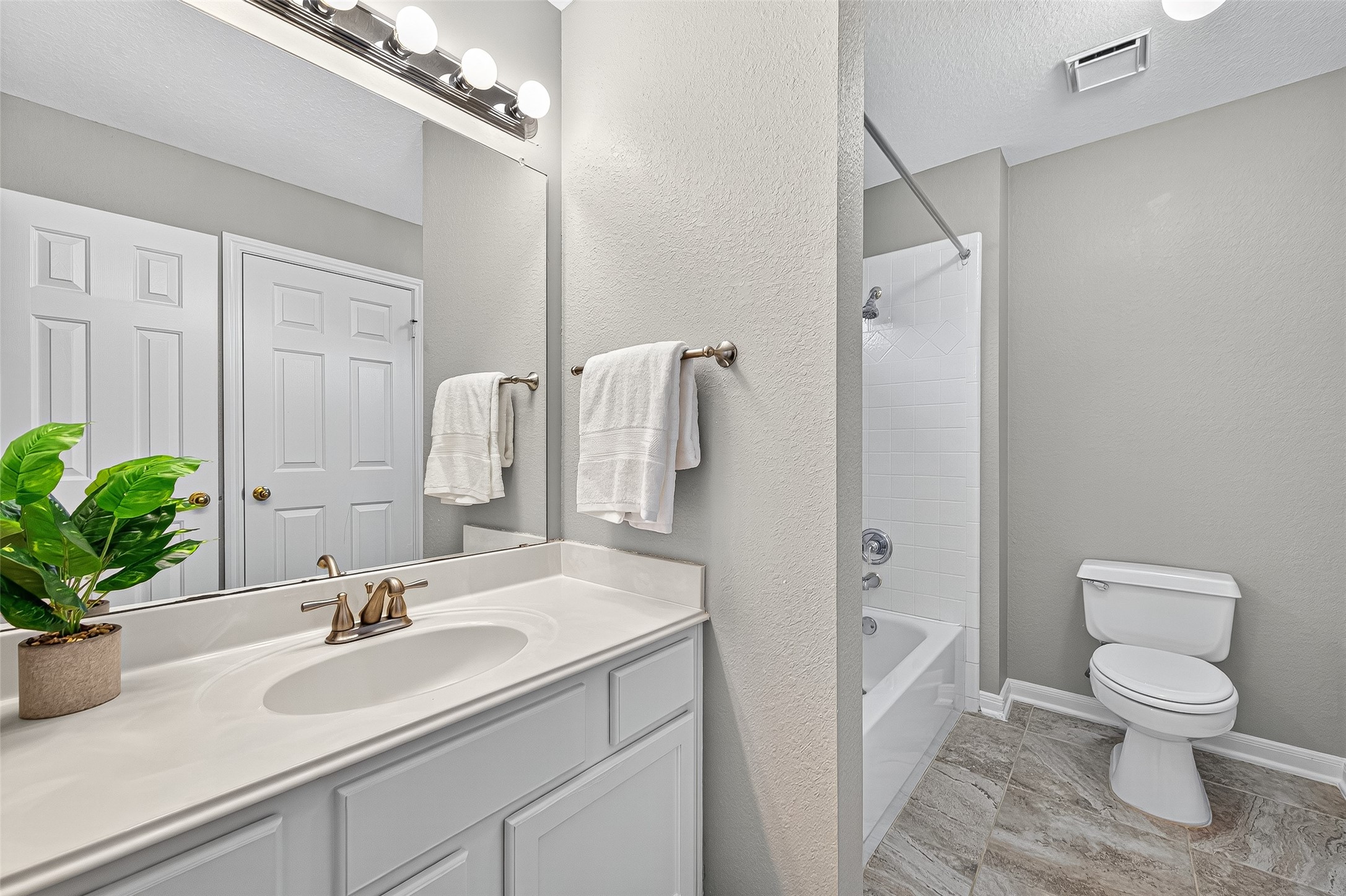 13011 Mossy Ridge Cove Houston, TX 77041 - Photo 36 of 50 a bathroom with a toilet sink and shower