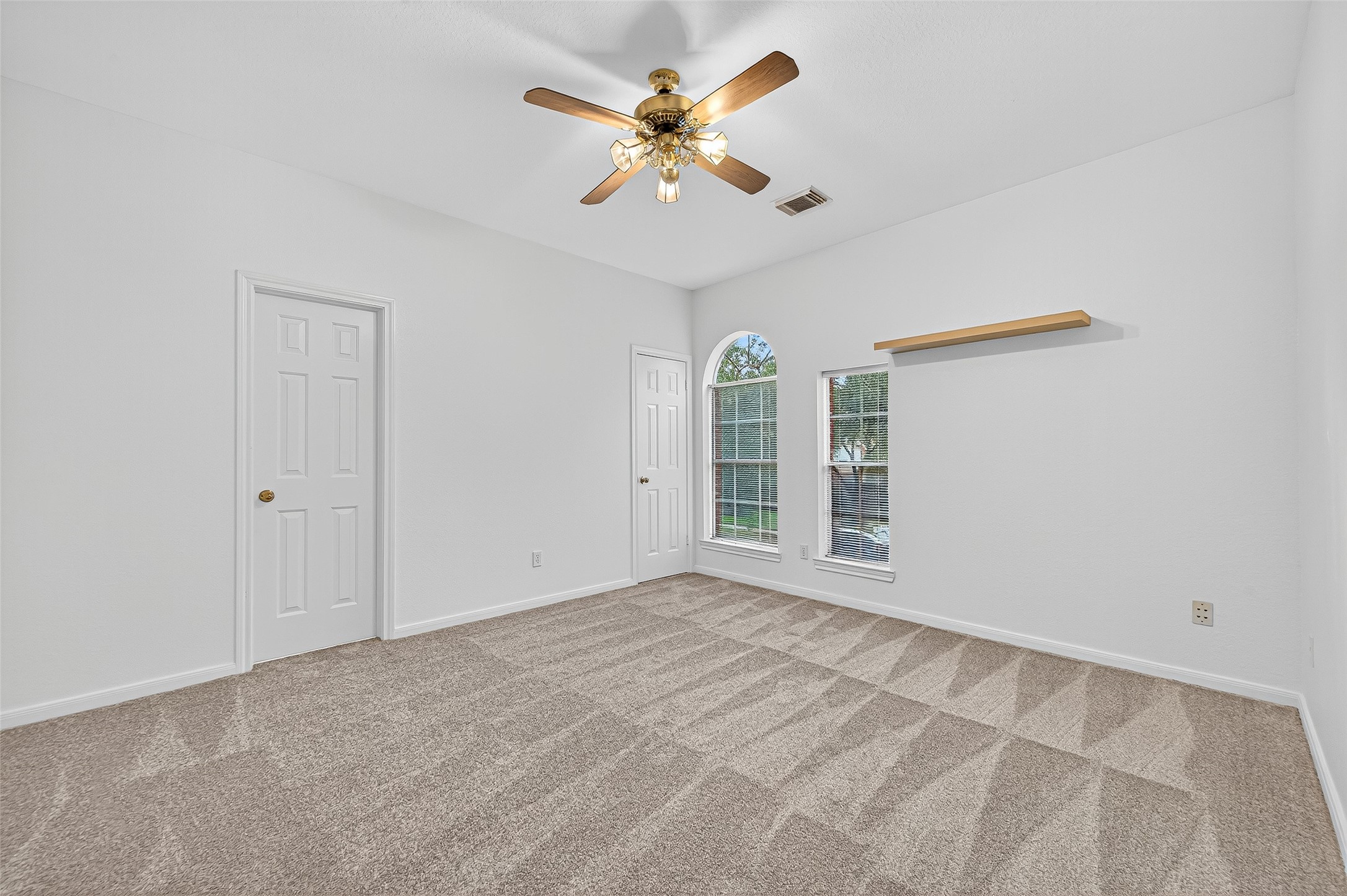 13011 Mossy Ridge Cove Houston, TX 77041 - Photo 40 of 50 a view of an empty room with a window