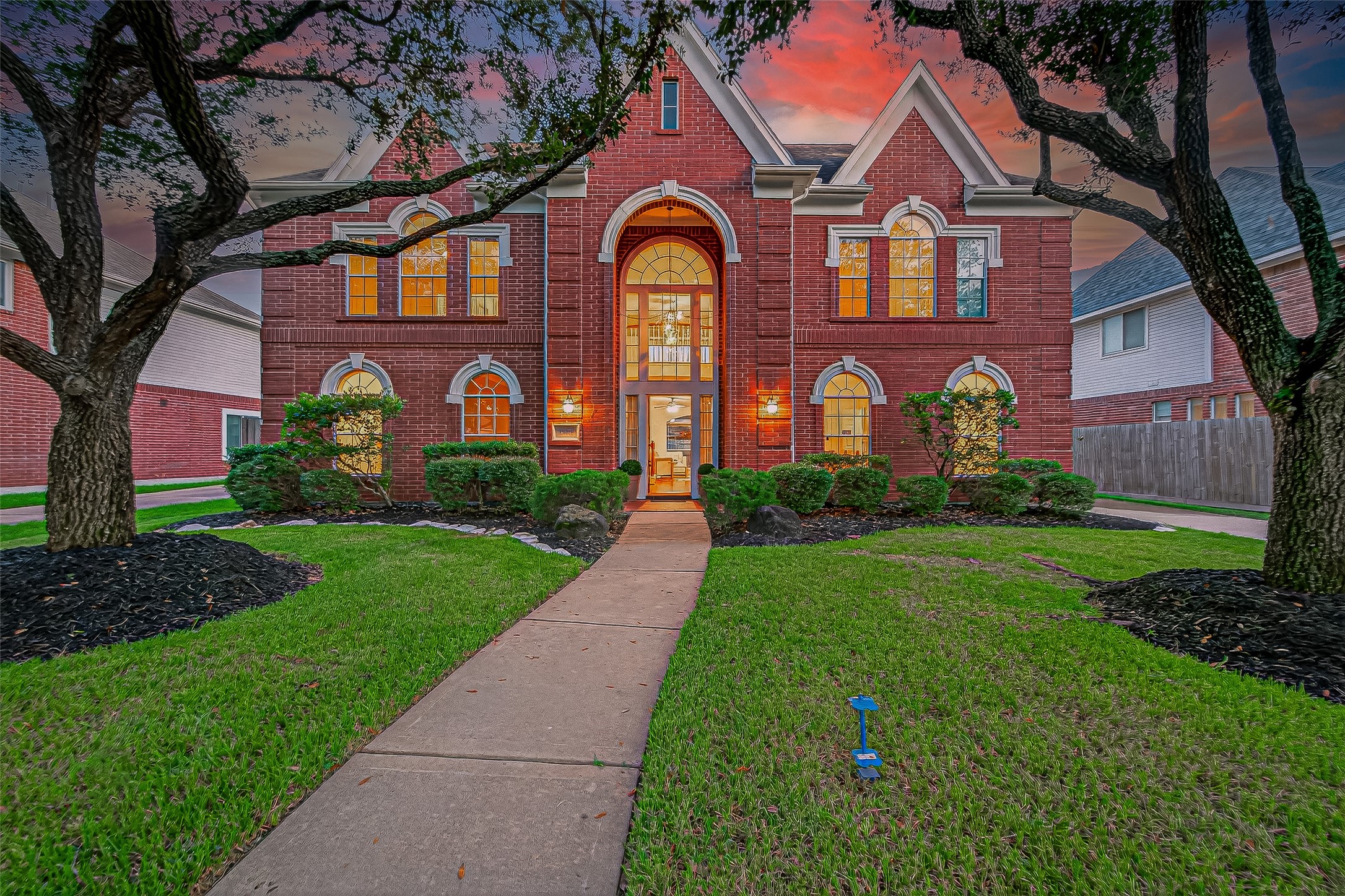 13011 Mossy Ridge Cove Houston, TX 77041 - Photo 4 of 50 a front view of a house with garden