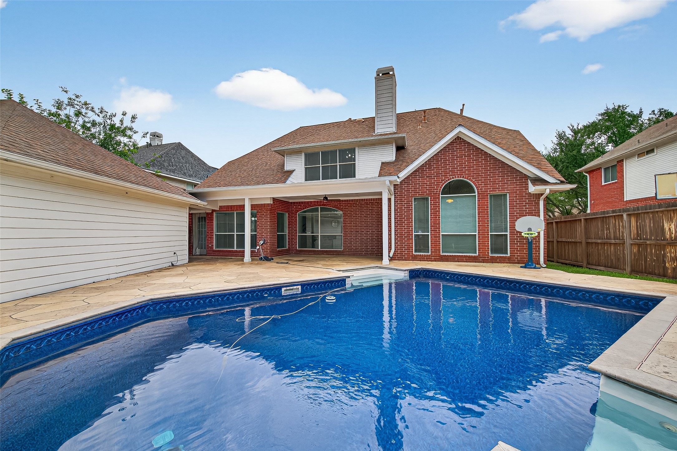 13011 Mossy Ridge Cove Houston, TX 77041 - Photo 44 of 50 a view of house with a swimming pool