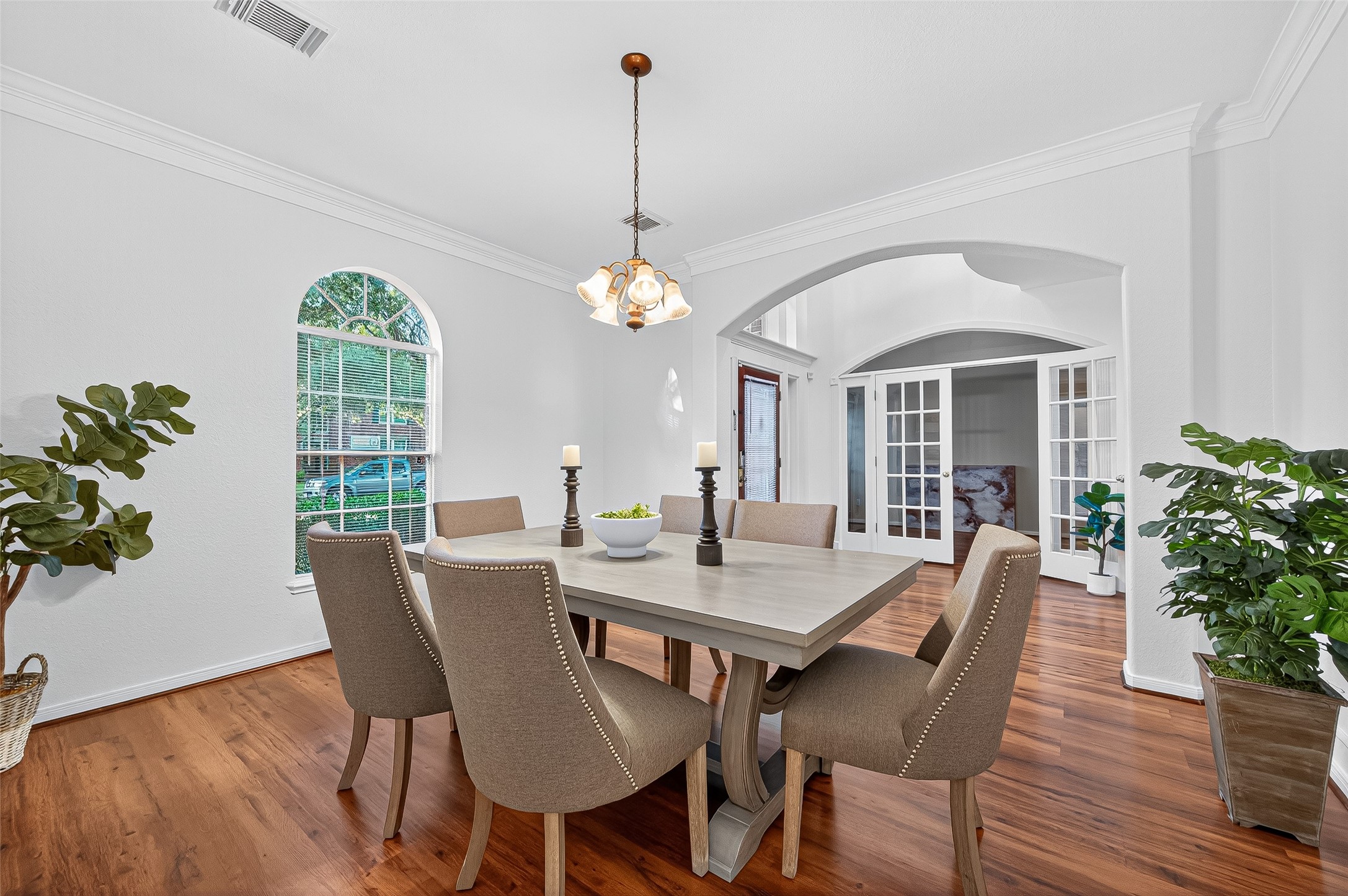 13011 Mossy Ridge Cove Houston, TX 77041 - Photo 8 of 50 a view of a dining room with furniture window and wooden floor