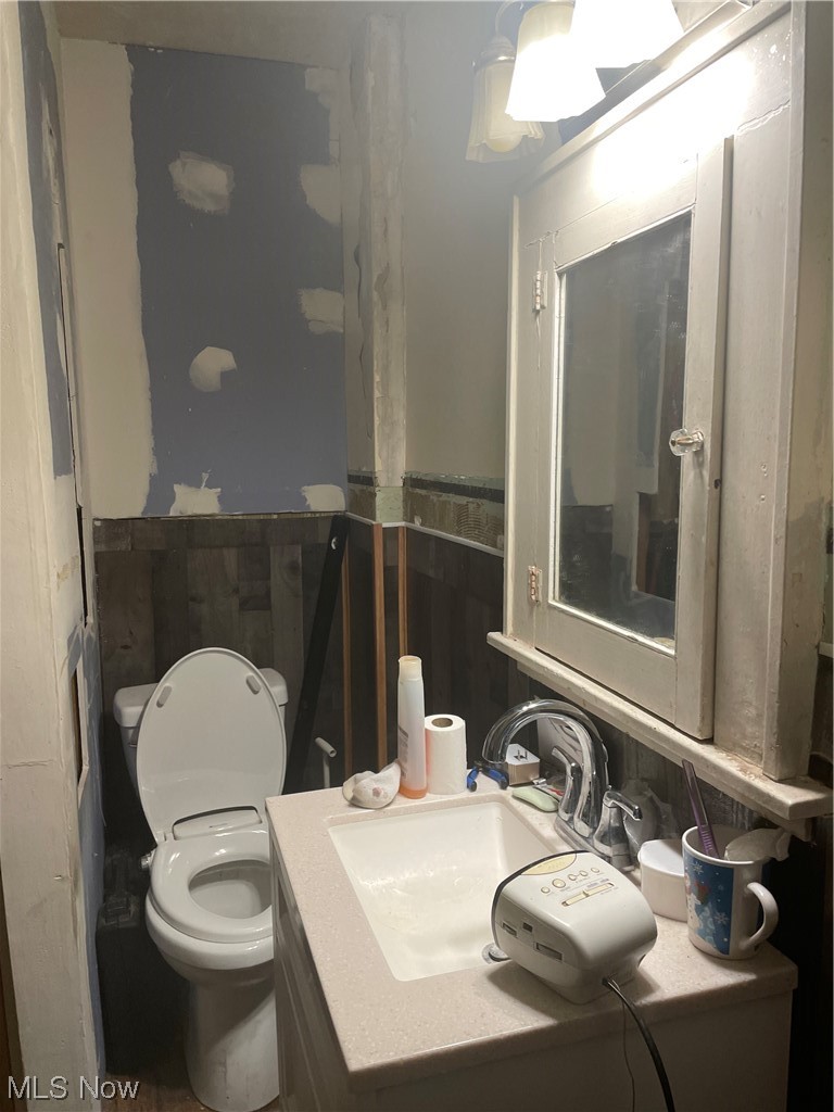 2511 Nicholas Place Northwest Canton, OH 44708 - Photo 9 of 11 Bathroom with toilet and oversized vanity