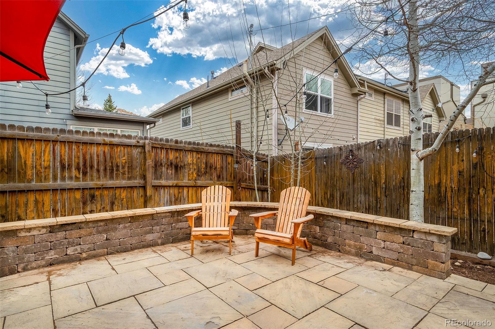 84 Inca Street Denver, CO 80223 - Photo 28 of 32 a view of outdoor space with seating