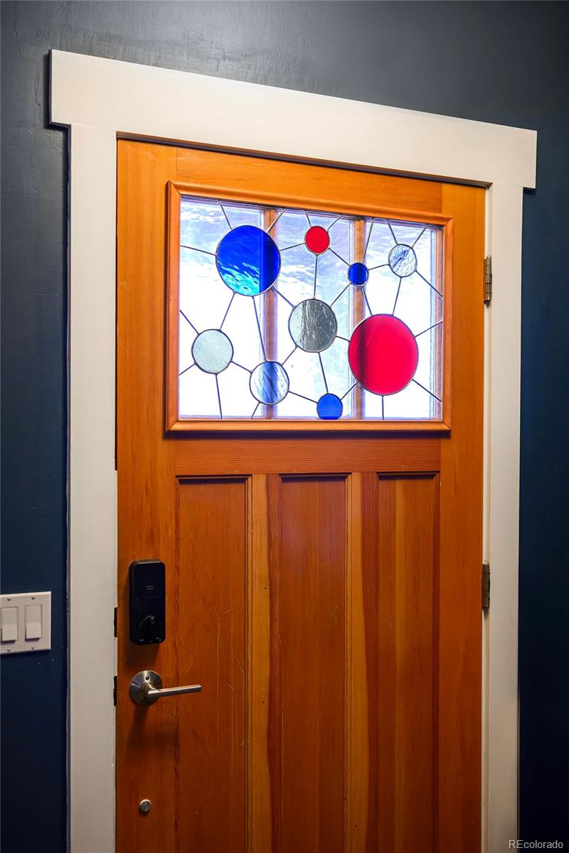 84 Inca Street Denver, CO 80223 - Photo 4 of 32 a close up of a door