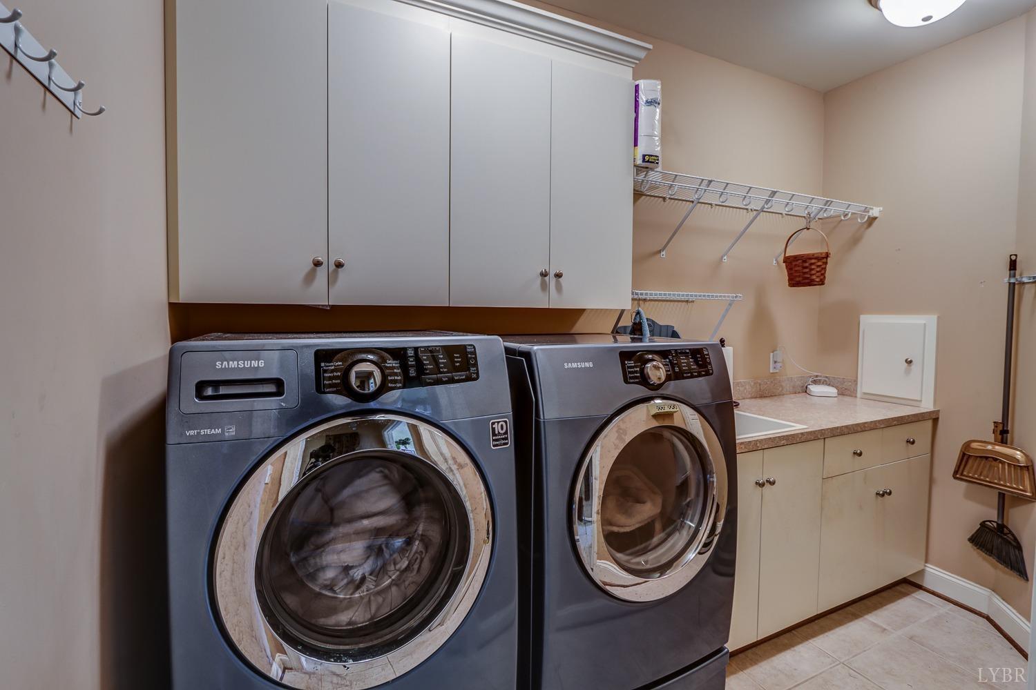 107 Emory Way Amherst, VA 24521 - Photo 24 of 85 a view of storage and utility room with washer and dryer