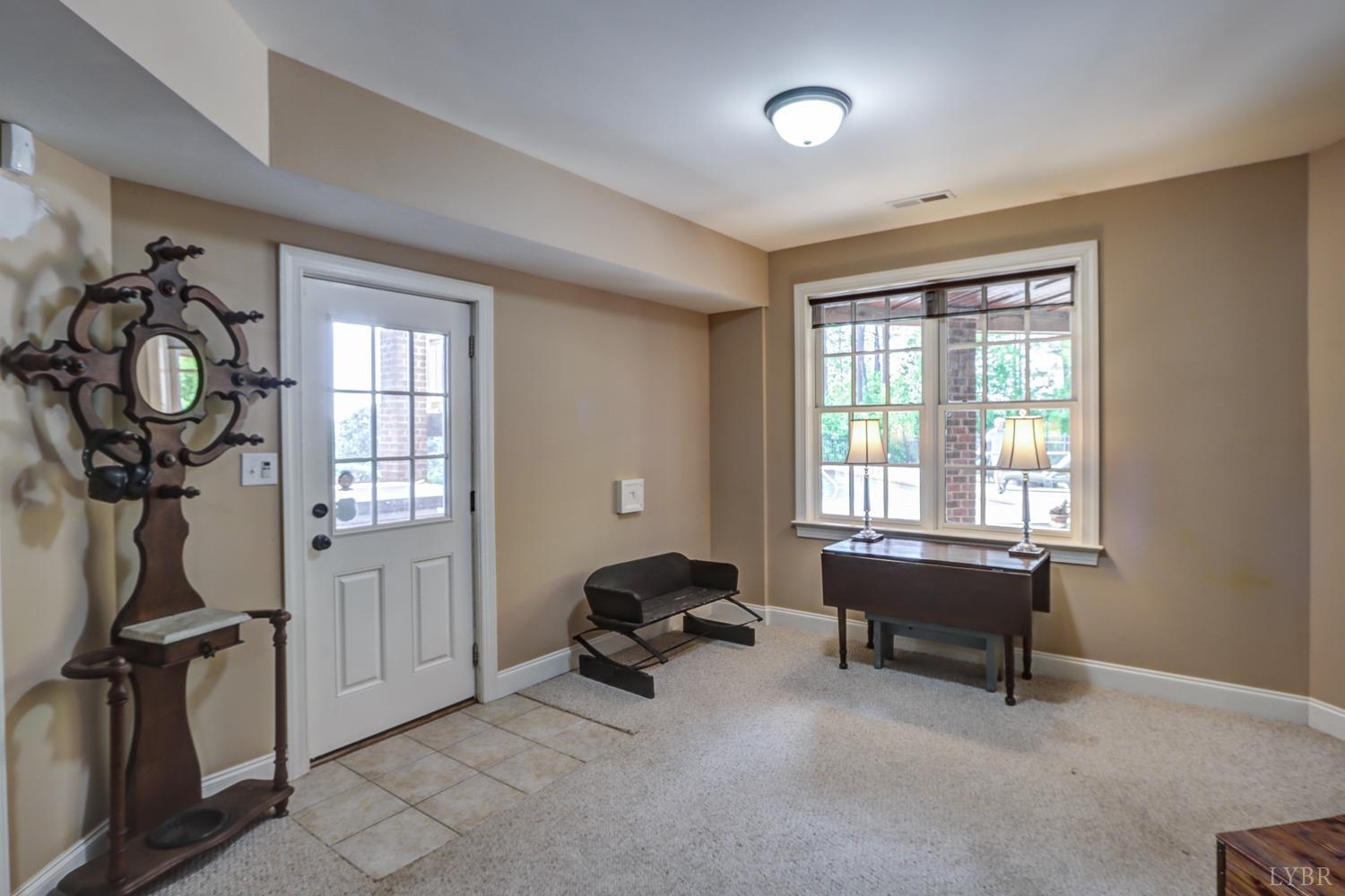 107 Emory Way Amherst, VA 24521 - Photo 60 of 85 Terrace level den with walkout to pool and hot tub!