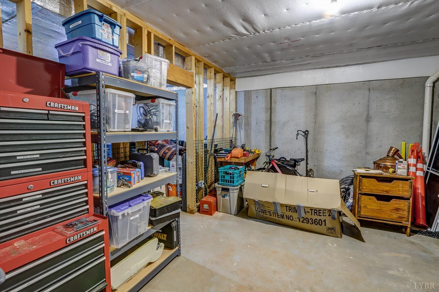 107 Emory Way Amherst, VA 24521 - Photo 64 of 85 Large unfinished basement with room for workshop and storage