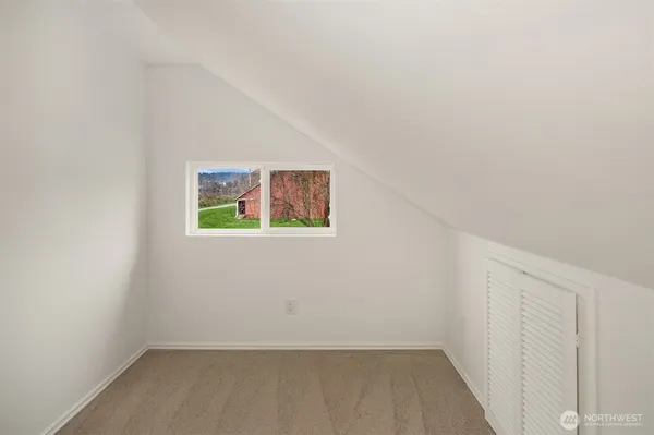 a view of a house with a big yard