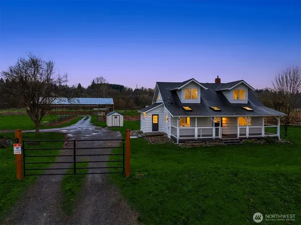 a view of a backyard of a house