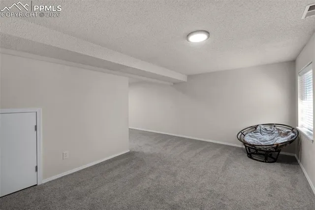 a view of a big room with wooden floor