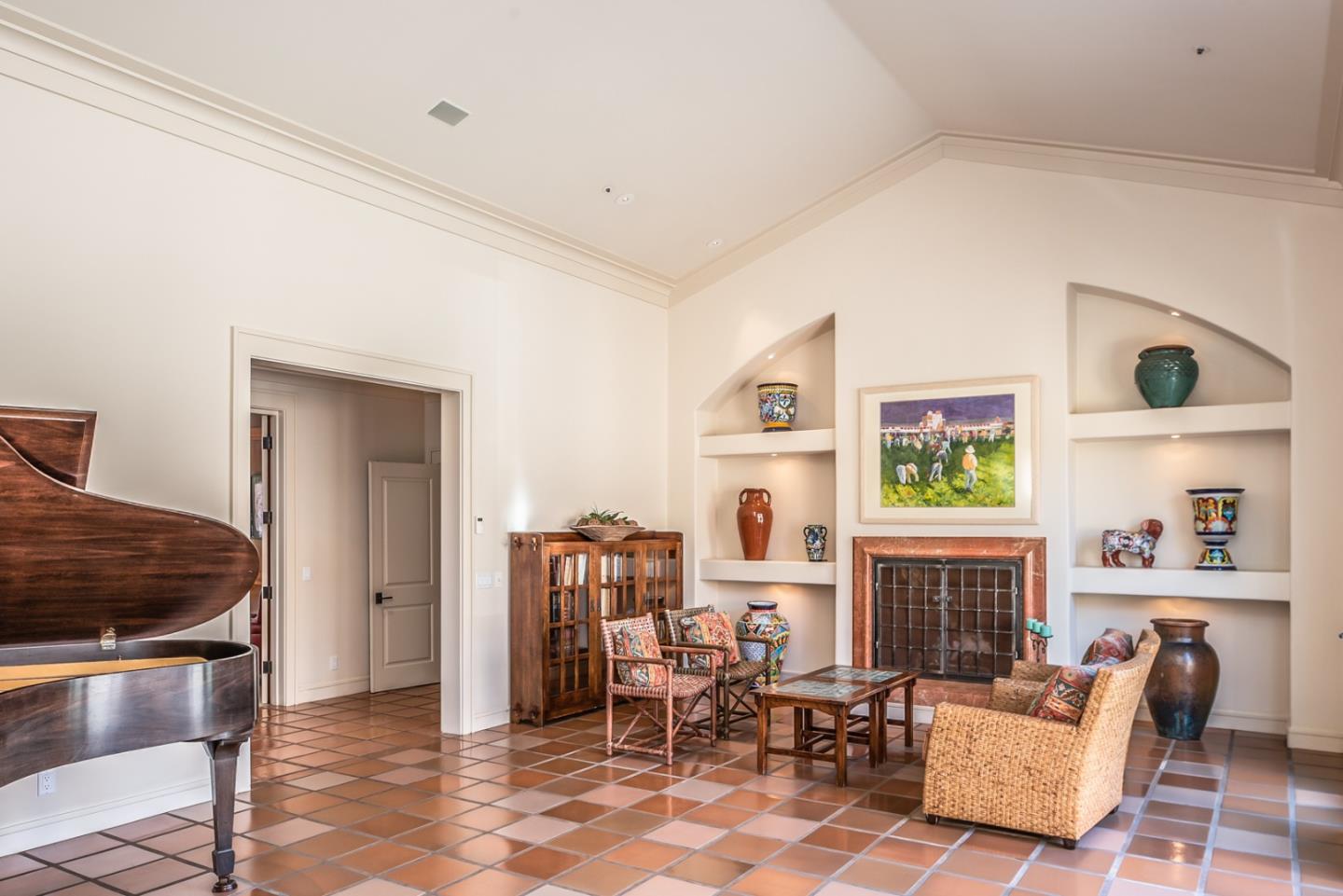 14550 Castlerock Road Salinas, CA 93908 - Photo 13 of 50 a living room with furniture and a fireplace