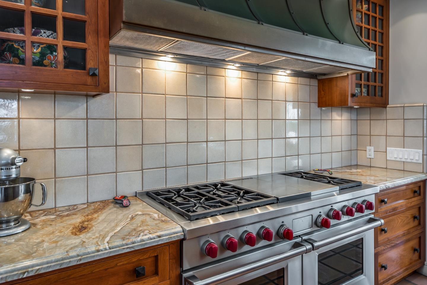 14550 Castlerock Road Salinas, CA 93908 - Photo 27 of 50 a stove top oven sitting inside of a kitchen