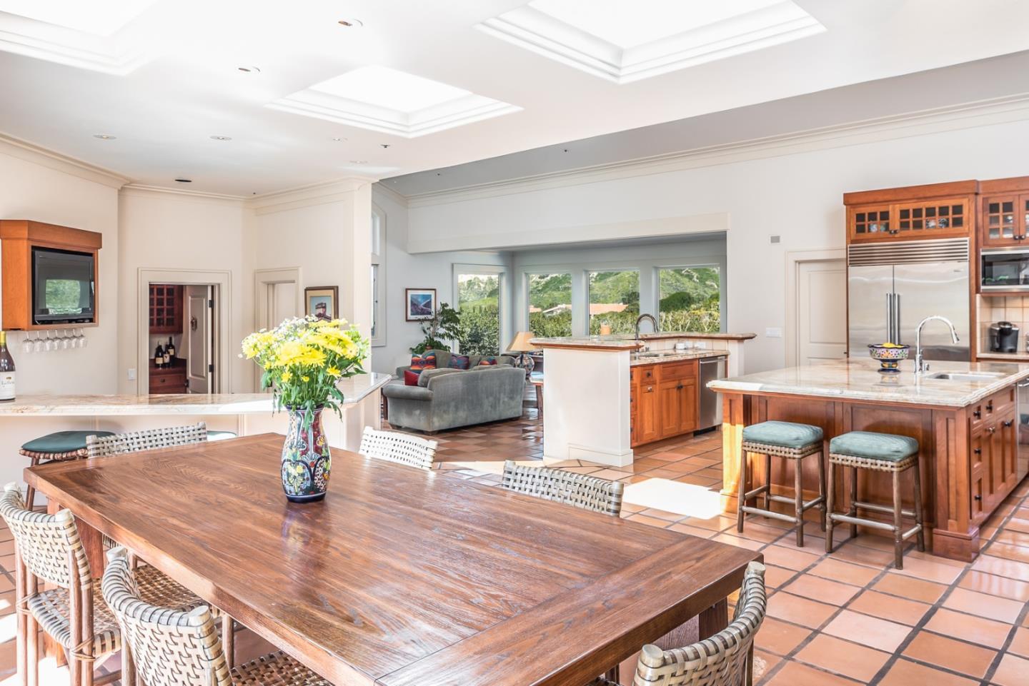 14550 Castlerock Road Salinas, CA 93908 - Photo 28 of 50 a living room with furniture dining table and a potted plant