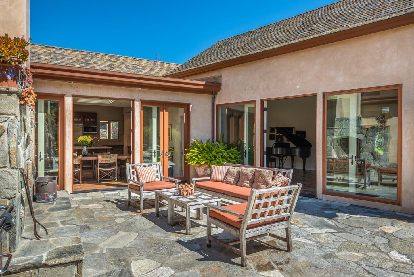 14550 Castlerock Road Salinas, CA 93908 - Photo 35 of 50 a view of a dinning tables and chair in the patio of the house