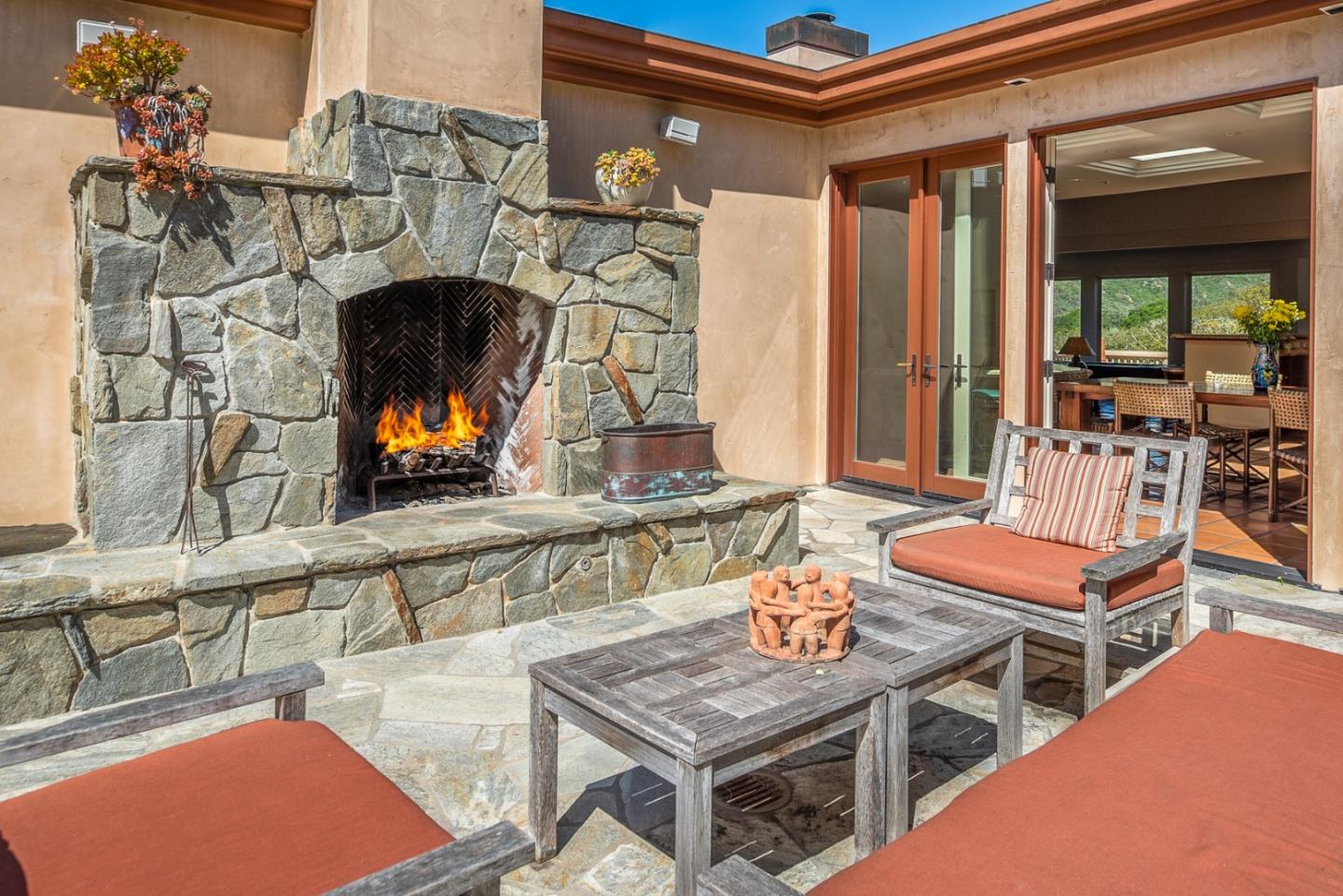 14550 Castlerock Road Salinas, CA 93908 - Photo 37 of 50 a living room with furniture a flat screen tv and a fireplace