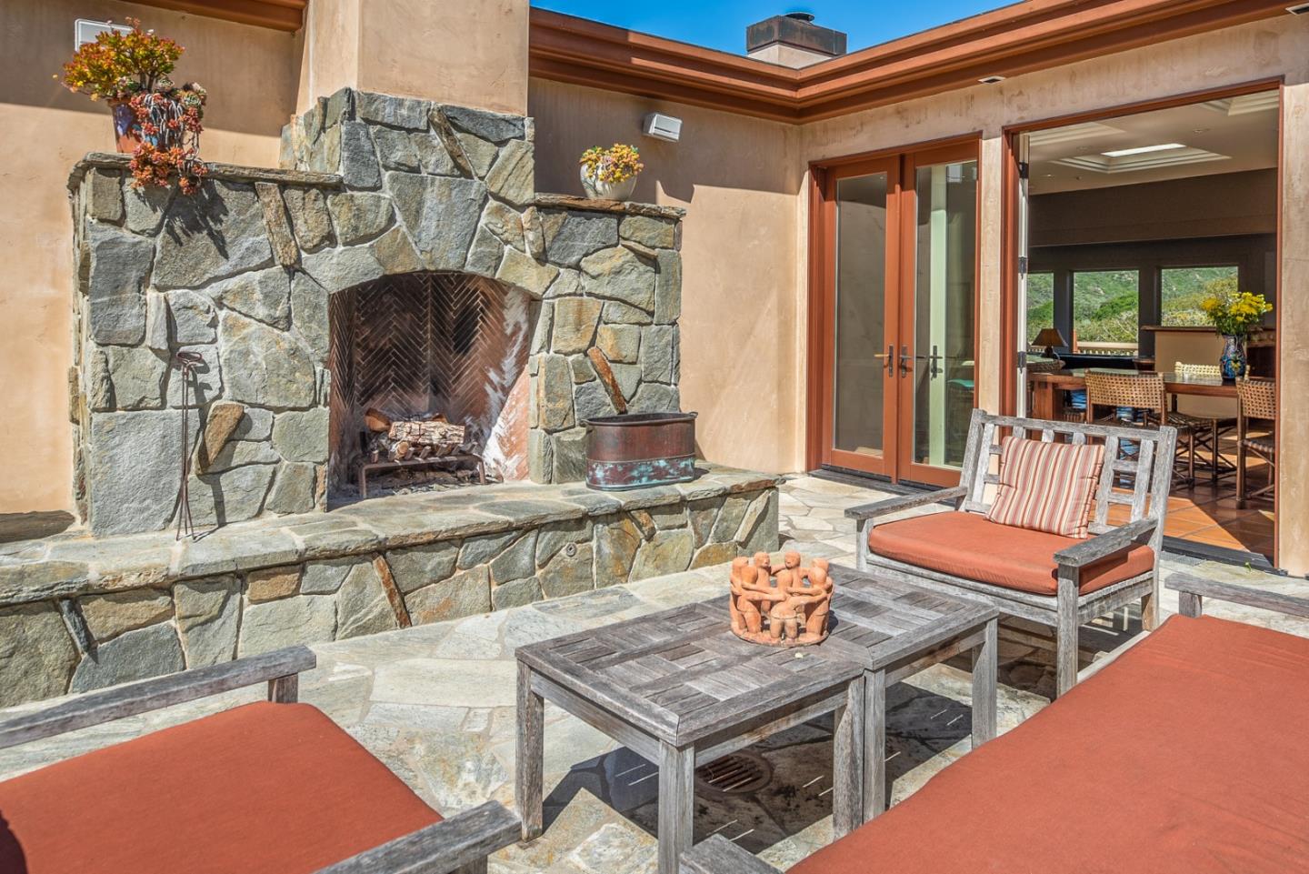 14550 Castlerock Road Salinas, CA 93908 - Photo 38 of 50 a outdoor living space with furniture and a fireplace