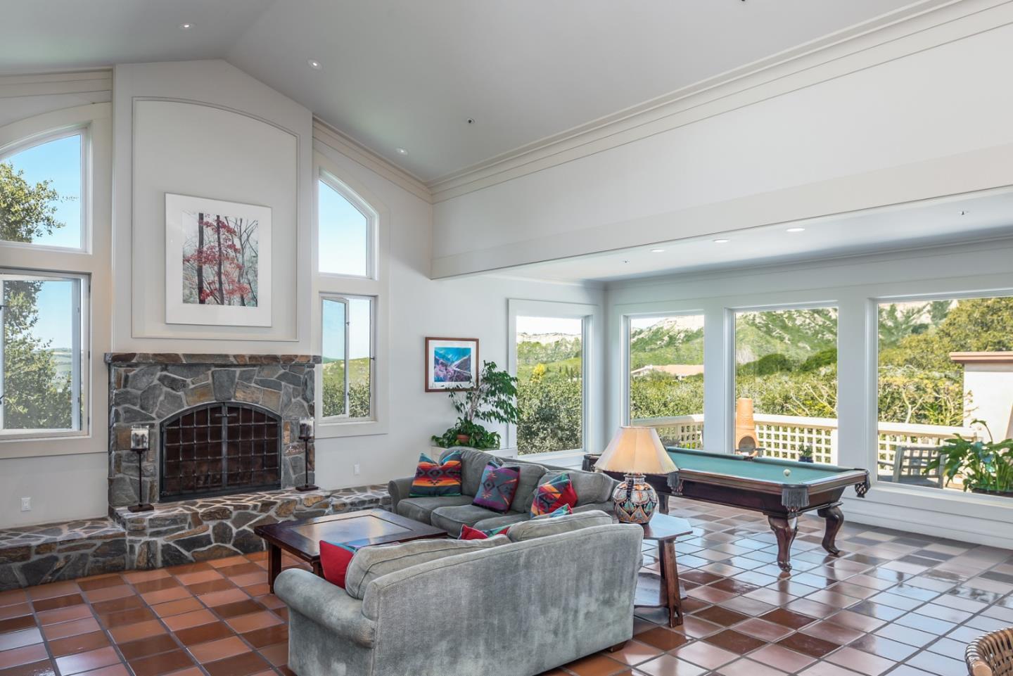 14550 Castlerock Road Salinas, CA 93908 - Photo 42 of 50 a living room with furniture and a fireplace