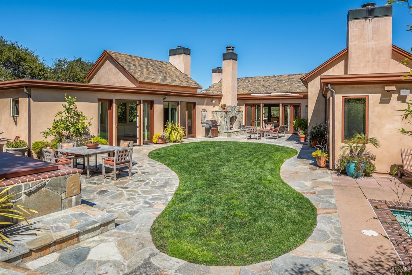 14550 Castlerock Road Salinas, CA 93908 - Photo 50 of 50 a view of a house with a chairs in patio