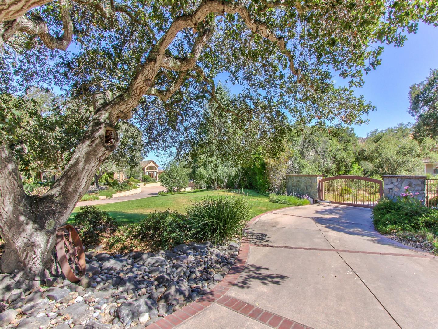 14550 Castlerock Road Salinas, CA 93908 - Photo 8 of 50 a view of a garden with large trees