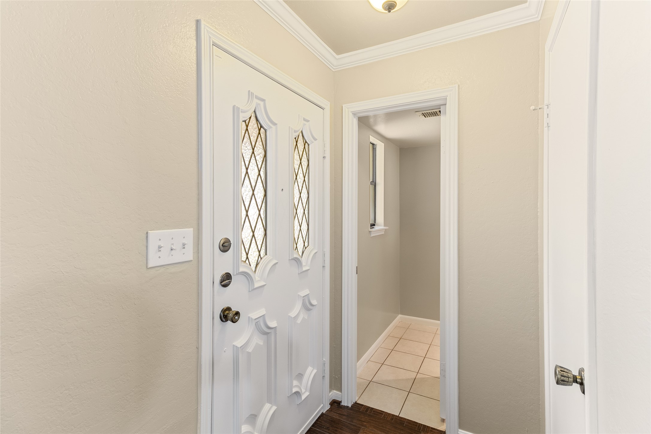 57 South Bachelor Button Street Lake Jackson, TX 77566 - Photo 13 of 29 Just off the front entry, you’ll find a convenient half bath & storage closet—perfect for guests and everyday functionality.