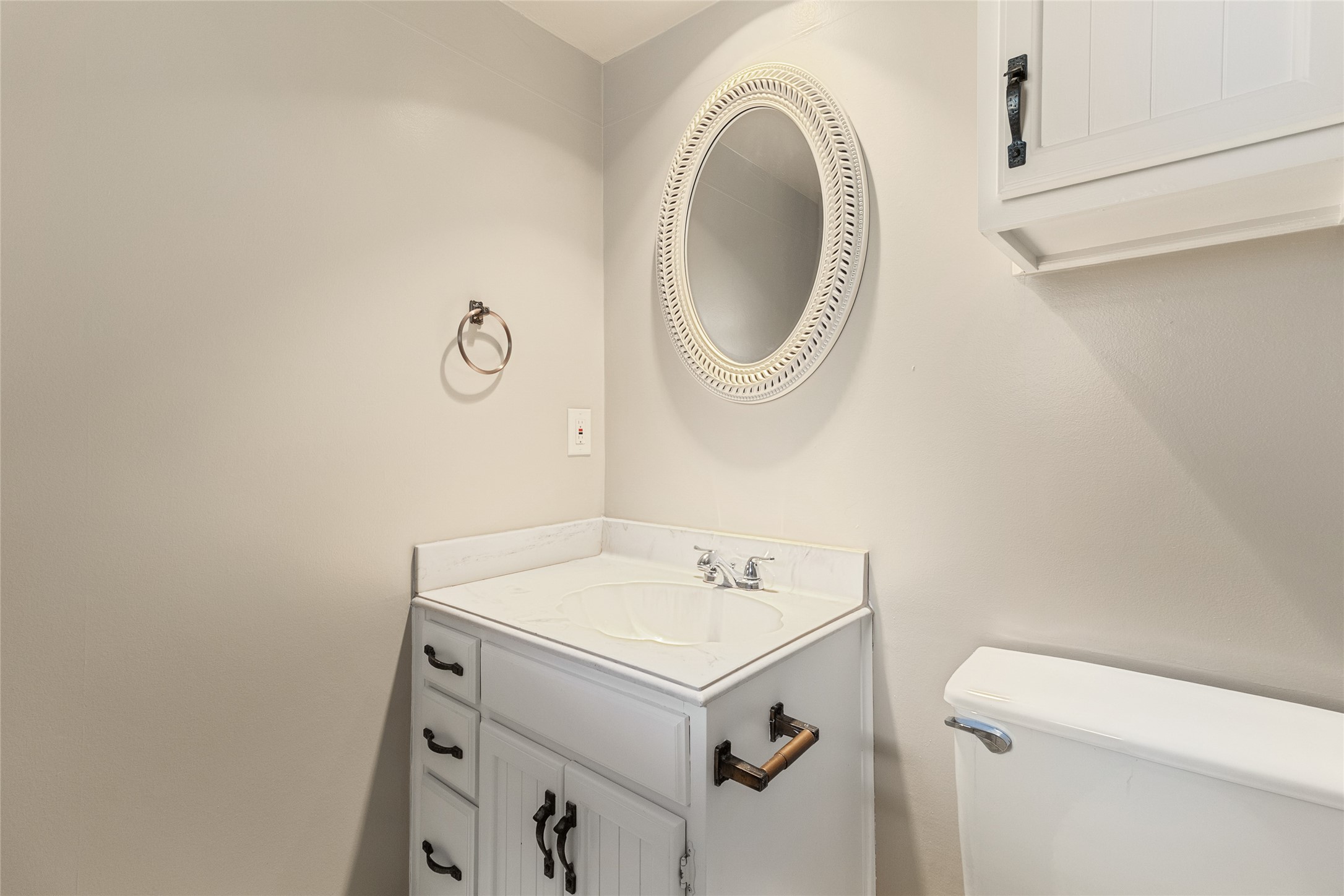 57 South Bachelor Button Street Lake Jackson, TX 77566 - Photo 14 of 29 Conveniently located on the first level, this half bath offers easy access for guests and complements the main downstairs living areas.