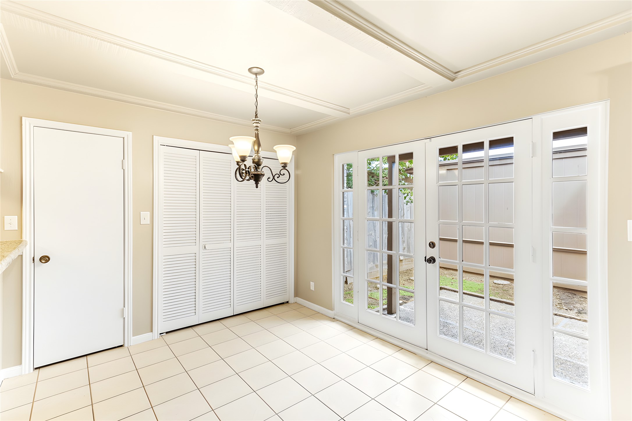 57 South Bachelor Button Street Lake Jackson, TX 77566 - Photo 6 of 29 One of the two dining spaces, the Breakfast Room (10x9) opens to the private courtyard & features a pantry with deep storage plus double doors opening to the laundry area.