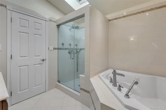 a bathroom with a sink and shower