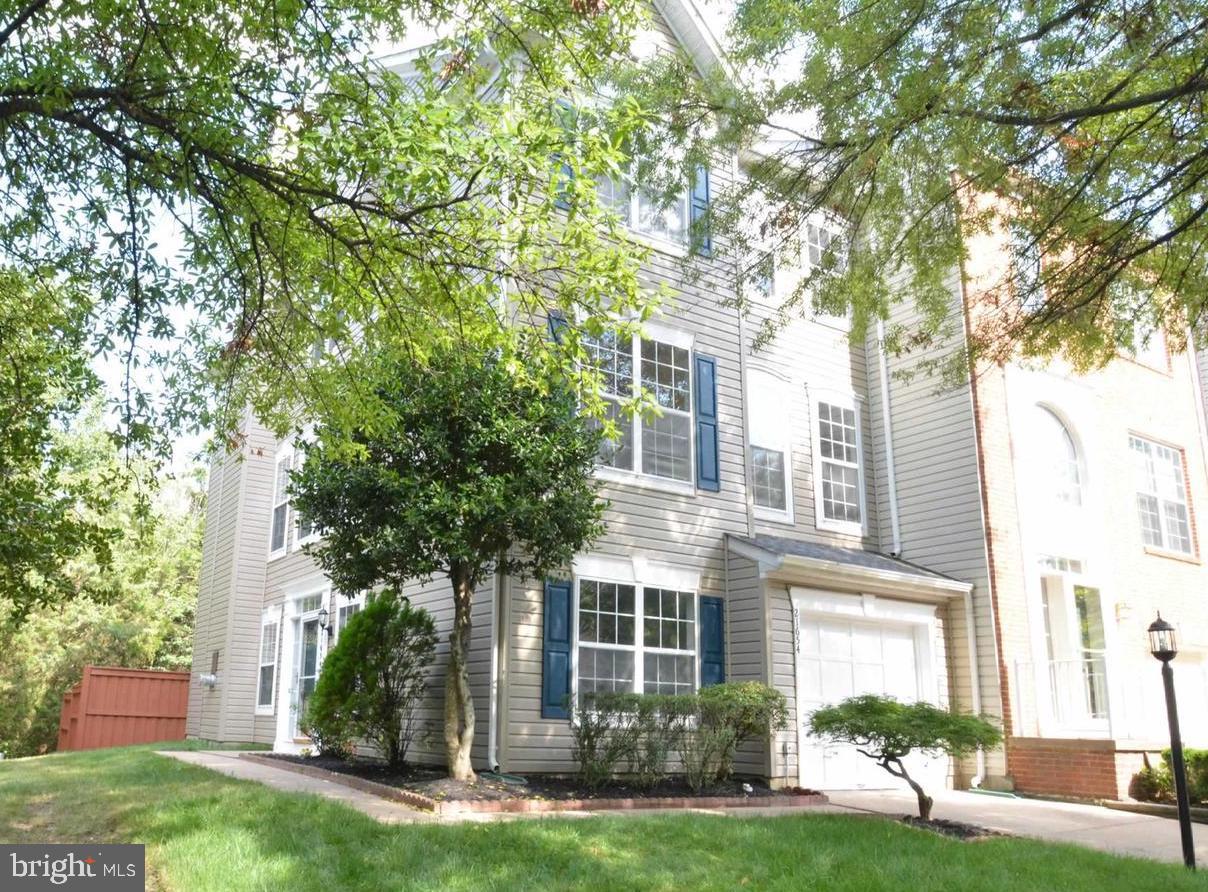 21654 Frame Square Broadlands, VA 20148 - Photo 1 of 43 Charming home with lush greenery.