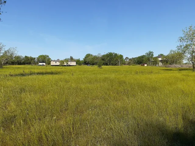 a view of an ocean from a mountain