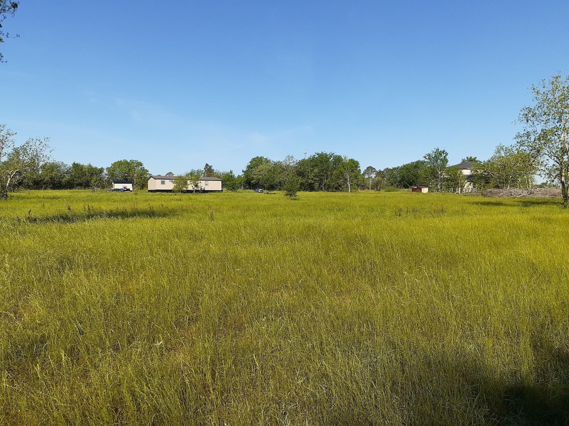 411 Wright Road East Bernard, TX 77435 - Photo 9 of 14 a view of an ocean from a mountain