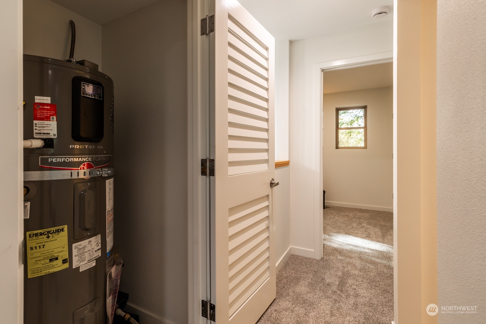 4901 Cleveland Street Port Townsend, WA 98368 - Photo 38 of 39 a view of a hallway with workspace and a window