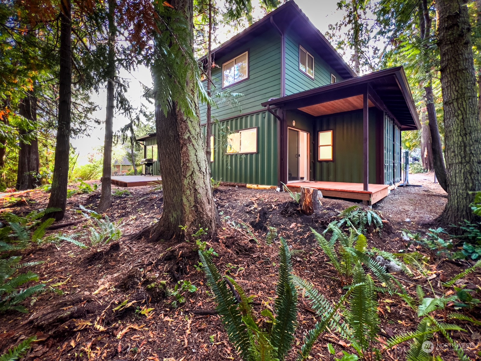 4901 Cleveland Street Port Townsend, WA 98368 - Photo 4 of 39 a view of a house with a yard