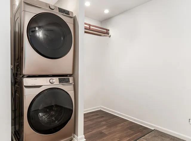 a view of a hallway with washer and dryer