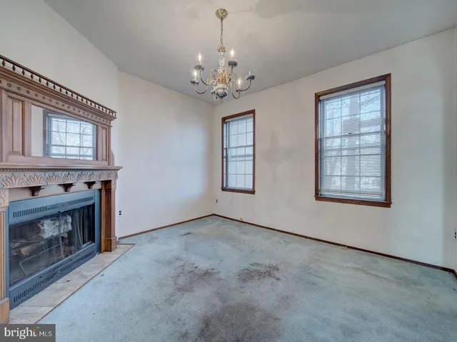a view of a livingroom with a fireplace