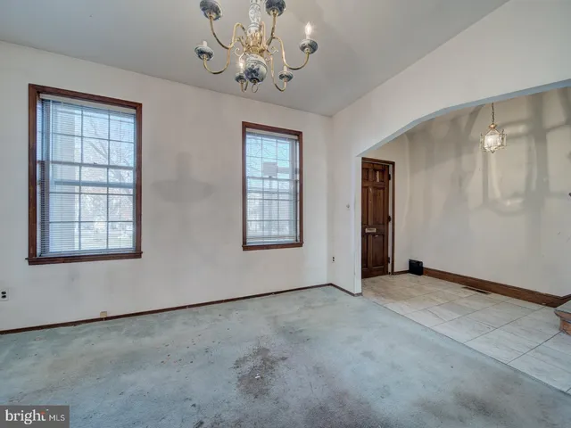 a kitchen with stainless steel appliances granite countertop a stove and a refrigerator