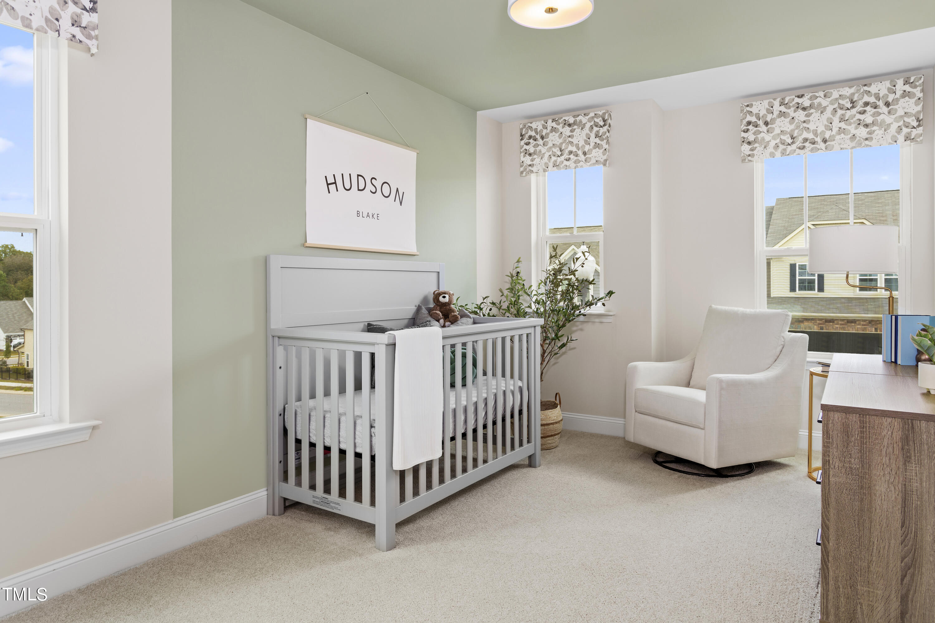 848 Channel Drop Loop Zebulon, NC 27597 - Photo 8 of 10 a bedroom with furniture and a window