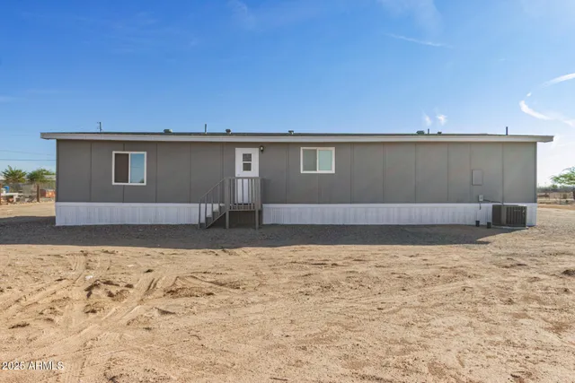 a view of a backyard of a house