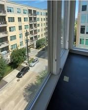 2111 Westheimer Road, Unit 1301 Houston, TX 77098 - Photo 2 of 10 a view of a balcony with a tree