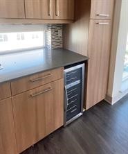 2111 Westheimer Road, Unit 1301 Houston, TX 77098 - Photo 4 of 10 a view of a kitchen with wooden floor