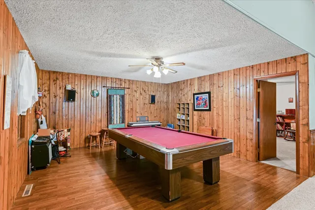 a view of a livingroom with furniture and front door