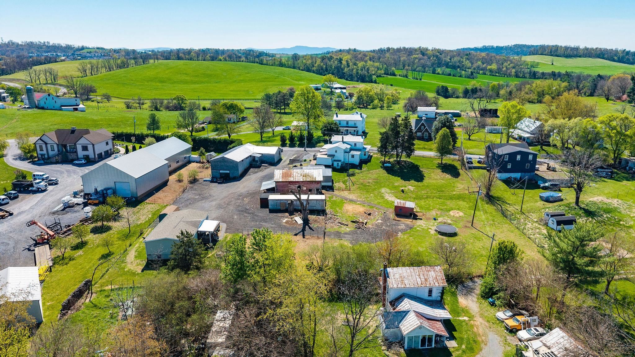 2061 Cecil Wampler Road Mount Crawford, VA 22841 - Photo 68 of 70 an aerial view of a house with a swimming pool patio and mountain view
